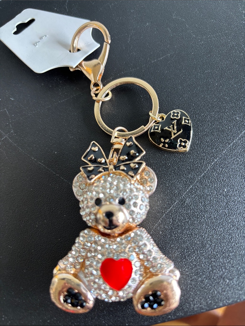 Louis Vuitton heart charm pull